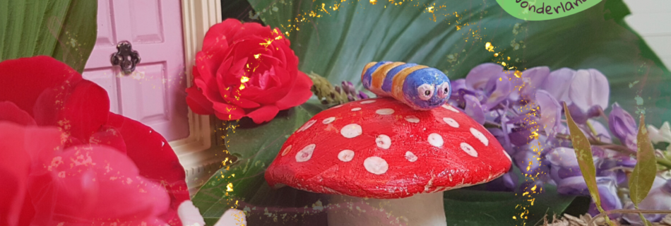 Salt dough recipe for sensory play. Image is of a toadstool and bug sculpture made from salt dough, in a garden filled with flowers and a secret pink door.